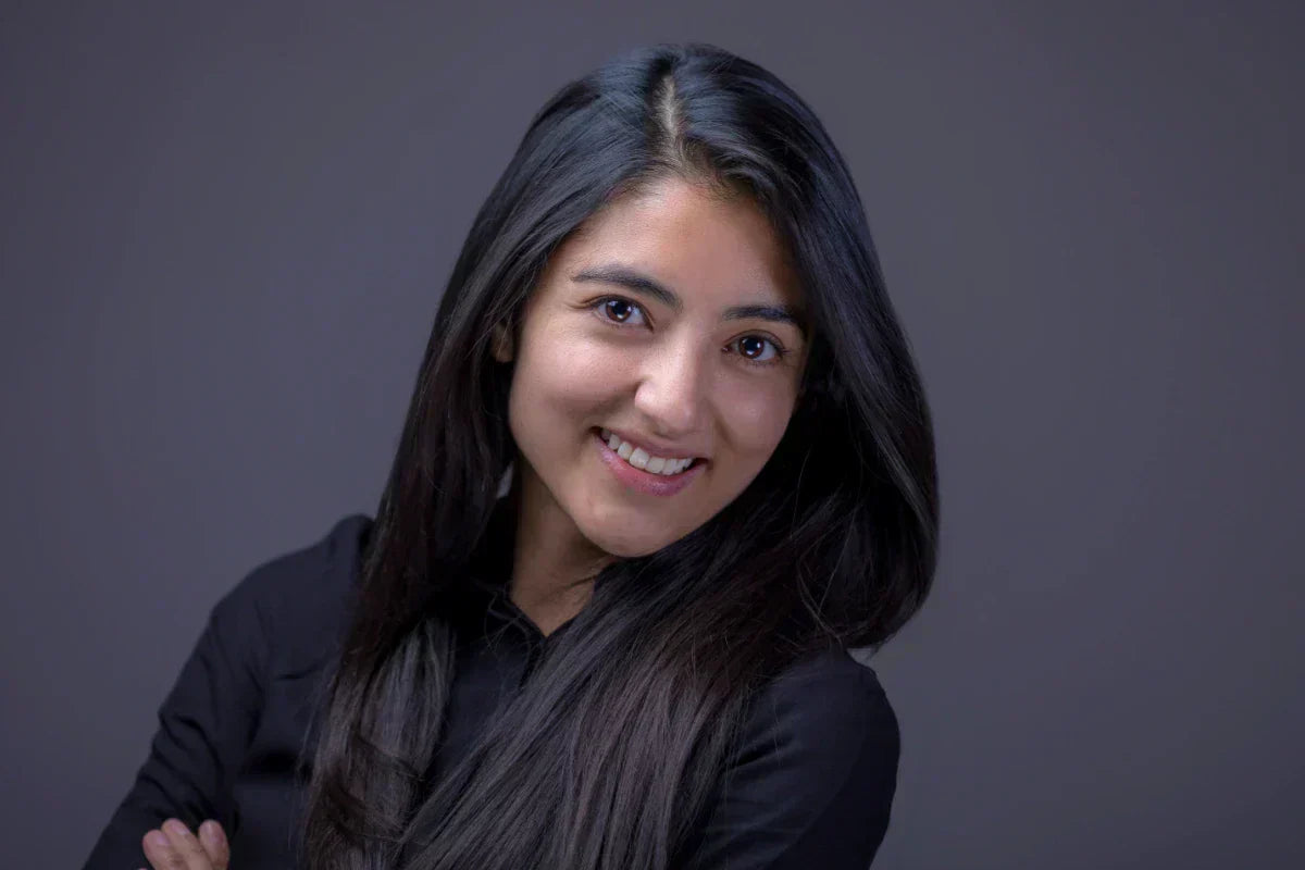 Smooth straight hair showcasing results of biotinoyl tripeptide-1 enriched hair care routine